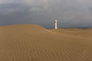 Punta Gallery: Lighthouse at sunrise with the dunes