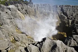 Limestone outcrops on cliffs. Punakaiki - South Island - New Zealand. Pancake rocks form the main focus for visitors in Paparoa National Park where huge outcrops of limestone have been formed by a process called stylobedding
