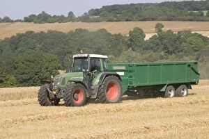MAB-94 Tractor hauling wheat from combine harvester