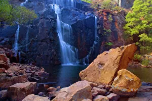Mac Kenzie Falls - water cascades down red cliffs of Mac Kenzie Falls into a picturesque plunge pool surrounded by gum