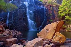 Waterfalls Prints: Mac Kenzie Falls - water cascades down red cliffs of Mac Kenzie Falls into a picturesque plunge pool surrounded by gum