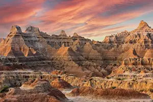 Peak Prints: Magnificent set of striated hoodoos set against the backdrop of sunset colors in the sky