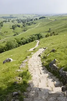 Deserted Prints: Malham Cove is a famous outcrop of curved limestone cliffs in Yorkshire Dales