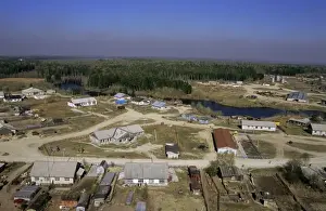 Taiga Prints: Maloyuganskii village, aerial view over the village and taiga-forest