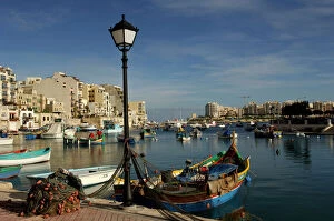 Boat Collection: Malta - Spinola Bay - once a thriving fishing port, but in recent years tourism has taken over