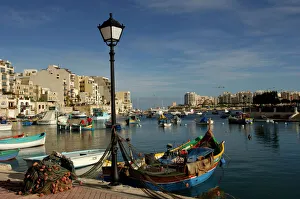 Boat Collection: Malta - Spinola Bay - once a thriving fishing port, but in recent years tourism has taken over
