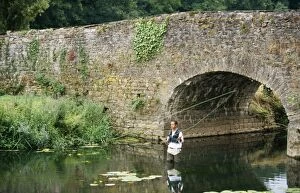 Angler Gallery: Man FISHING - for Trout near bridge