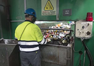 Manual sorting of plastic and metal waste in
