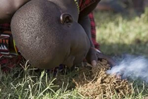 Images Dated 20th August 2008: Masai Warrior - starting fire