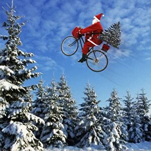 ME-1257-M1 Father Christmas - on bicycle flying through the air