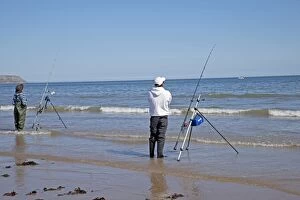 Two men beach fishing