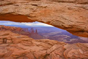 Mesa Arch - View through Mesa Arch into the maze of canyons and rock formations - Islands in the Sky, Canyonlands National Park, Utah, USA