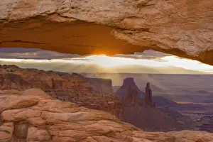 Arches Prints: Mesa Arch - View through Mesa Arch into the maze of canyons and rock formations - Islands in the Sky