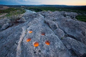 Brewster Gallery: Metate holes in rock along the Rio Grande