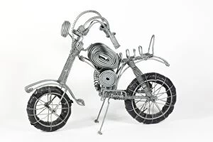 Images Dated 5th April 2009: Model motorcycle made from soft steel wire made and sold by Kenyan street kids Africa