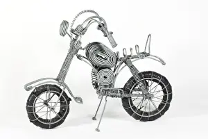 Motorbike Prints: Model motorcycle made from soft steel wire made and sold by Kenyan street kids Africa
