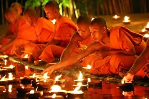 Monks celebrate the Loy Krathong festival at Wat Phan Ta