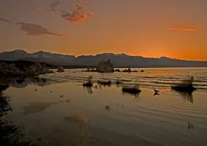Mono Lake - at 6400 feet. Famous for its tufa pinnacles, threat from Los Angeles water supply, and its birds. Sunset East side of Sierra Nevada near Lee Vining, USA