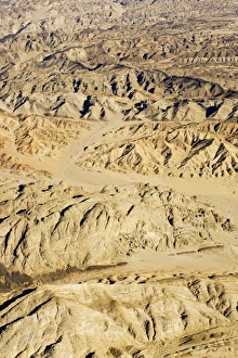 Dolerite Gallery: The Moon Valley from the air - landscape showing folded marbles gneisses