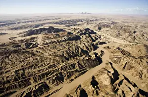 The Moon Valley from the air - landscape showing folded marbles gneisses and doerite dykes - from the 500 million year metamorphism of the Damaran rocks - Damaran orogeny - Namib Desert - Namibia - Africa