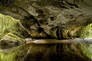 Arches Prints: Moria Gate Arch and picturesque Oparara river seen from the inside of the arch which is actually more a cave Oparara