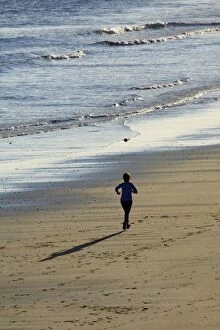 Exercising Gallery: Morning Jogger - on North Sea beach