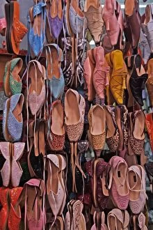 Morocco - market stall selling traditional shoes