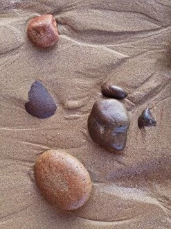 Morocco - Pebbles in the sand at Legzira beach