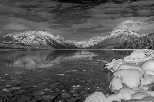 Haney Prints: Mountains reflect in wintry Lake McDonald in Glacier National Park