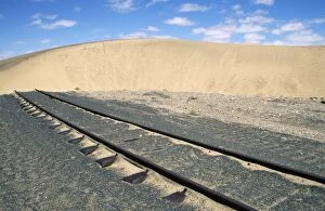 Namibia - railway line blocked by moving sand dune