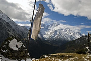 Nepal, Dole. Prayer flags on a ridge above