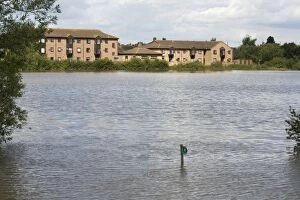 Images Dated 26th May 2007: New houses built on flood plain with submerged footpath sign Newtown - Tewkesbury