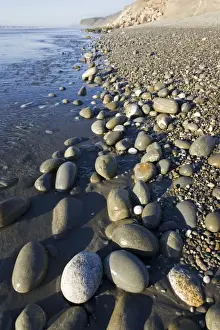 Deserted Prints: New Zealand - deserted pebble beach at low tide near Punakaiki - South Island