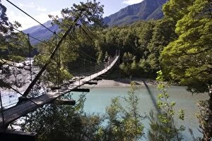 New Zealand - Tourists crossing wire suspension