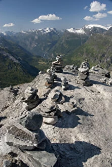 Norway, Geiranger. Travelers stone stacks