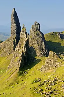 Skye Prints: Old Man of Storr bizarre rock formation Old Man of Storr and rolling green slopes Isle of Skye