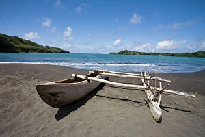 Boat Collection: Outrigger canoe On a beach on Tanna Island, Vanuatu