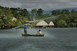 People fishing - casting nets. Dulce River - Guatemala