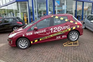 Economy Prints: Peugeot 308 HDI French motor car claiming new record 126 miles per gallon - Bristol UK