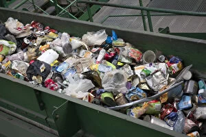 Environmental Issue Gallery: Plastic waste on sorting conveyor belt in a recycling