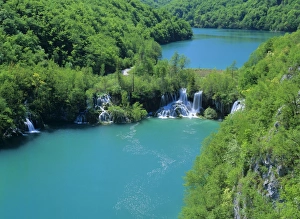 Plitvice Lakes - lower canyon with waterfalls and turqoise coloured lakes seen from above