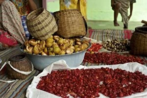 Agricultre Gallery: Processing Nutmeg - baskets and red coloured mace