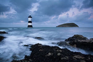 Storm Gallery: Puffin Island and lighthouse Winter