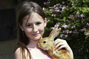 Images Dated 17th May 2006: Rabbit - being held by girl
