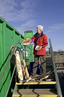 Recycling - Woman recycling cardboard