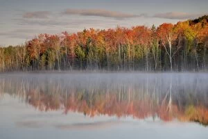 Red Jack Lake - trees in autumn colours refelected in lake