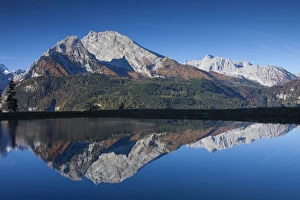 Reflection of Mount Watzmann in a small lake