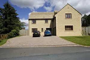 Flooding Prints: Residential houses with large areas of paved frontage decreasing capacity for water absorption during heavy rain
