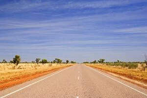 Road to nowhere - a perfectly straight bitumen road, which leads for hours and hours through dry bushland
