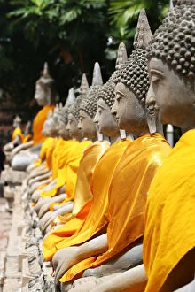 Row of Buddha statues at Wat Yai Chaimongkol Temple